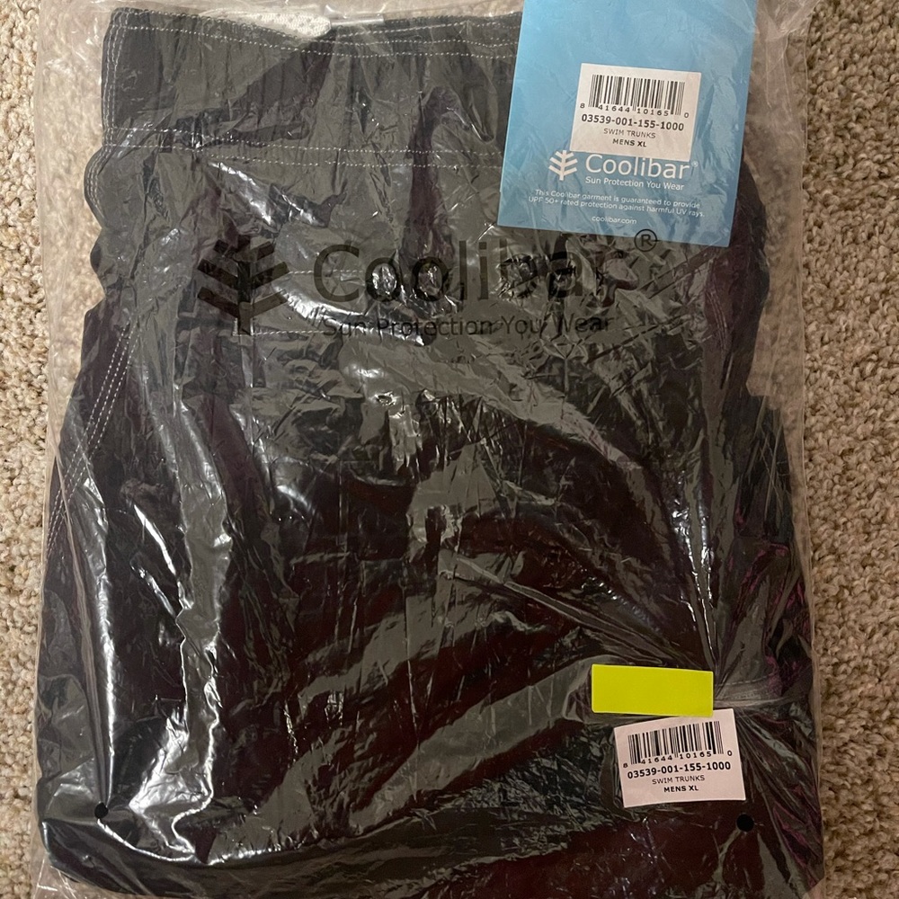 Coolibar swim trunks. Never worn. Still in package